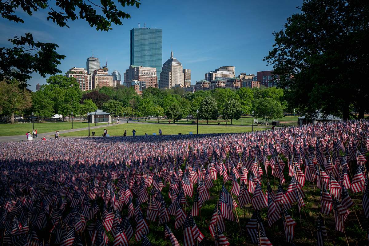 boston USA flag field near green trees memorial day